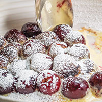 Cherry gratinata with limoncello zabaglione