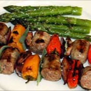 Grilled sausage and vegetable skewers