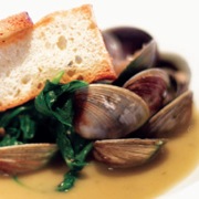 Steamed cockles with wilted arugula