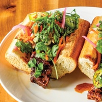 Pork adobo bahn mi sandwich