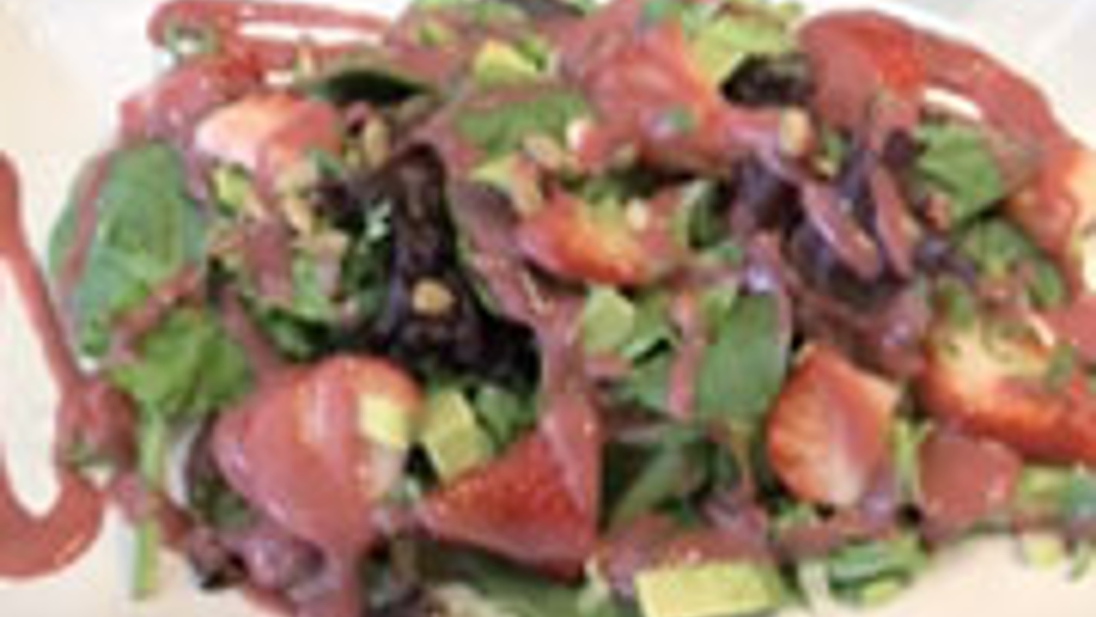 Strawberry, avocado and greens with ruby dressing