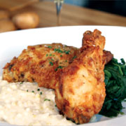 Buttermilk fried chicken with whipped potatoes and braised greens