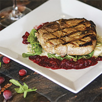 Pork T-bones with cranberry chutney and celery root mash