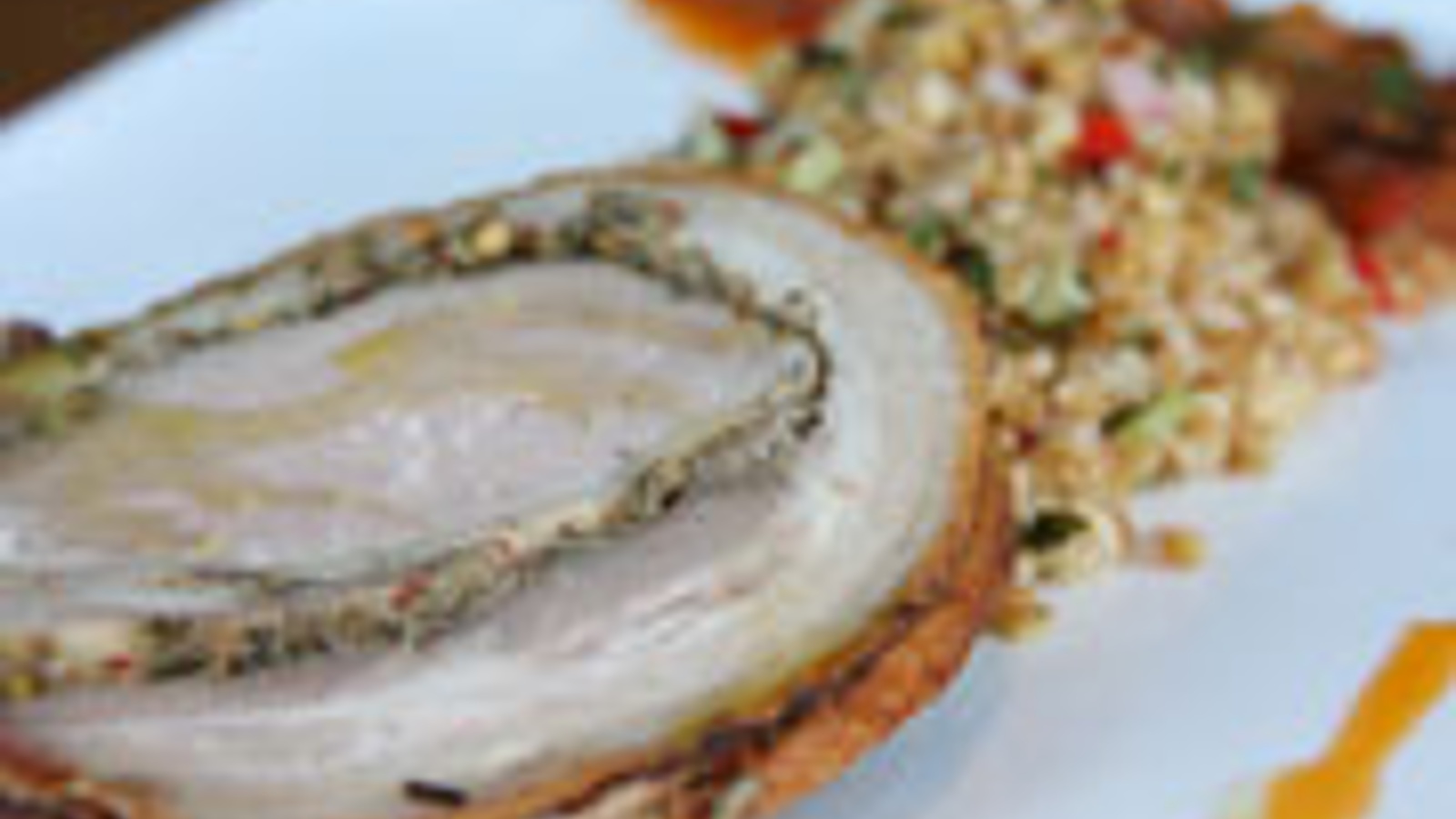 Roast porchetta with farro and caponata