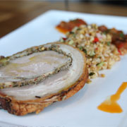 Roast porchetta with farro and caponata