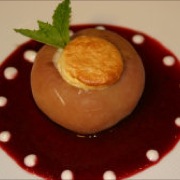 Roast donut peach with almond souffle and cherry coulis