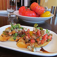 Mixed heirloom tomato bruschetta