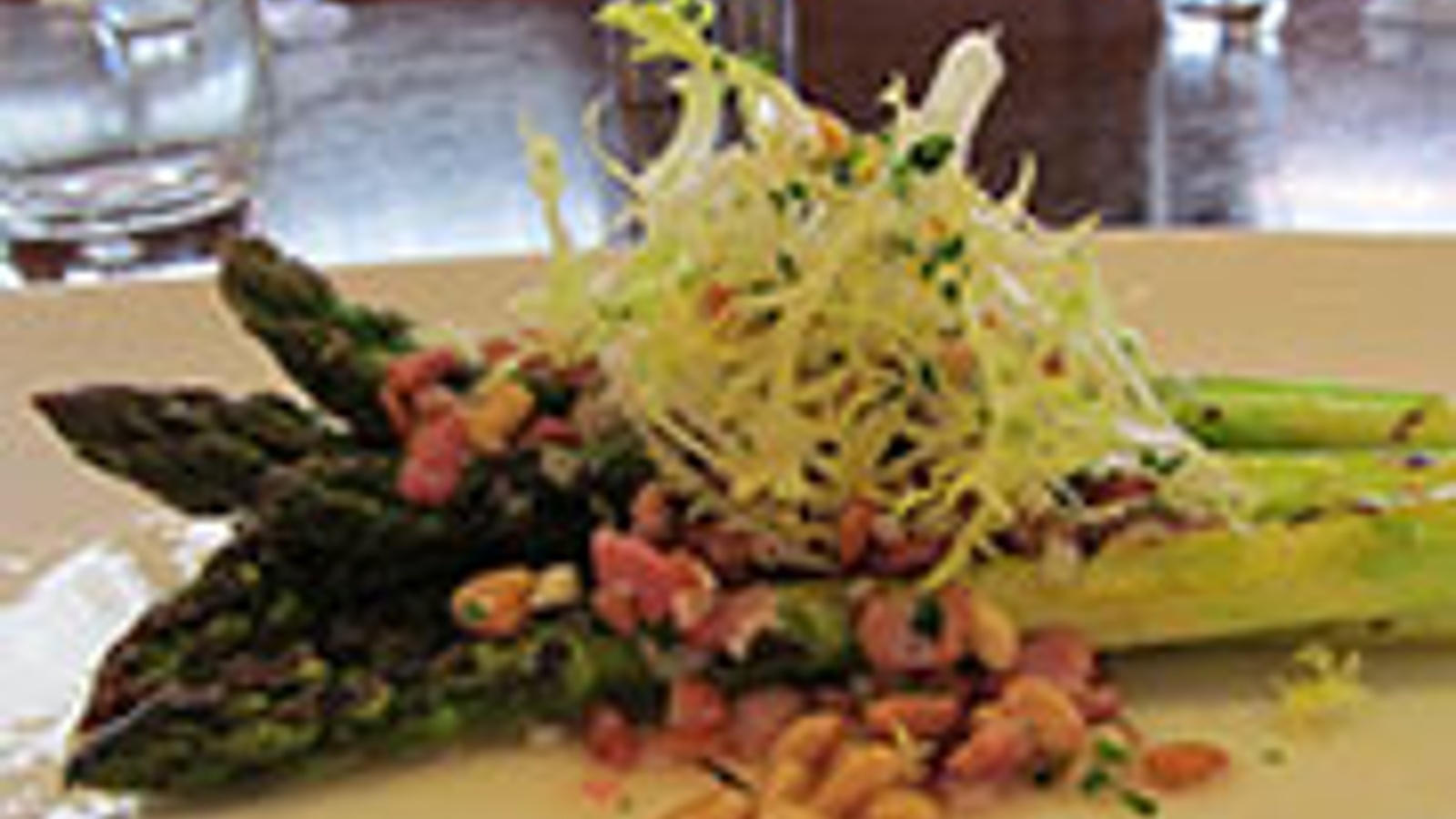 Grilled asparagus with pancetta vinaigrette and toasted pine nuts