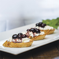 Homemade ricotta cheese with balsamic blueberries