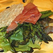 Roasted asparagus with Serrano ham and toasted Asiago cheese crisps