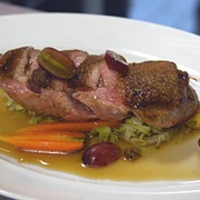 Duck breast with carrots, cabbage and grapes