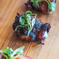 Bacon-wrapped dates stuffed with blue cheese