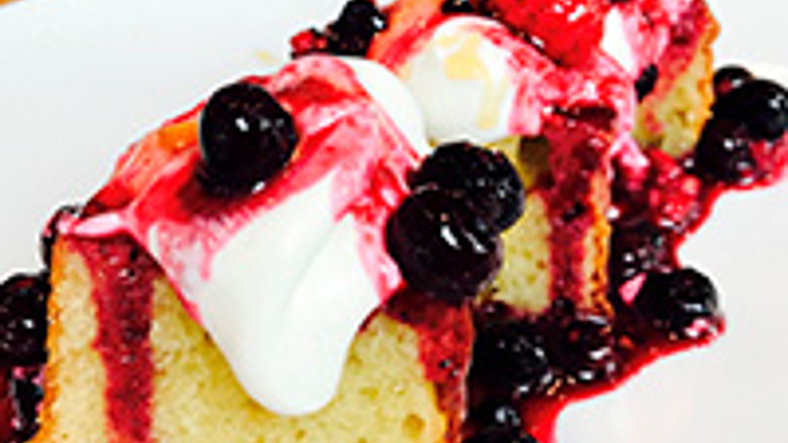 California olive oil cake with Chantilly cream and seasonal fruit